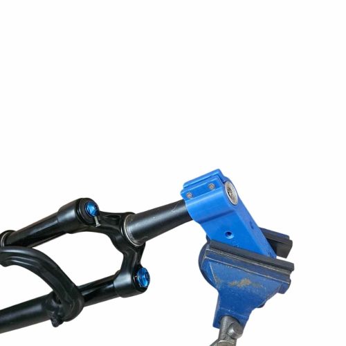 outil permettant de fixer dans un étau une fourche de vtt pour la réviser