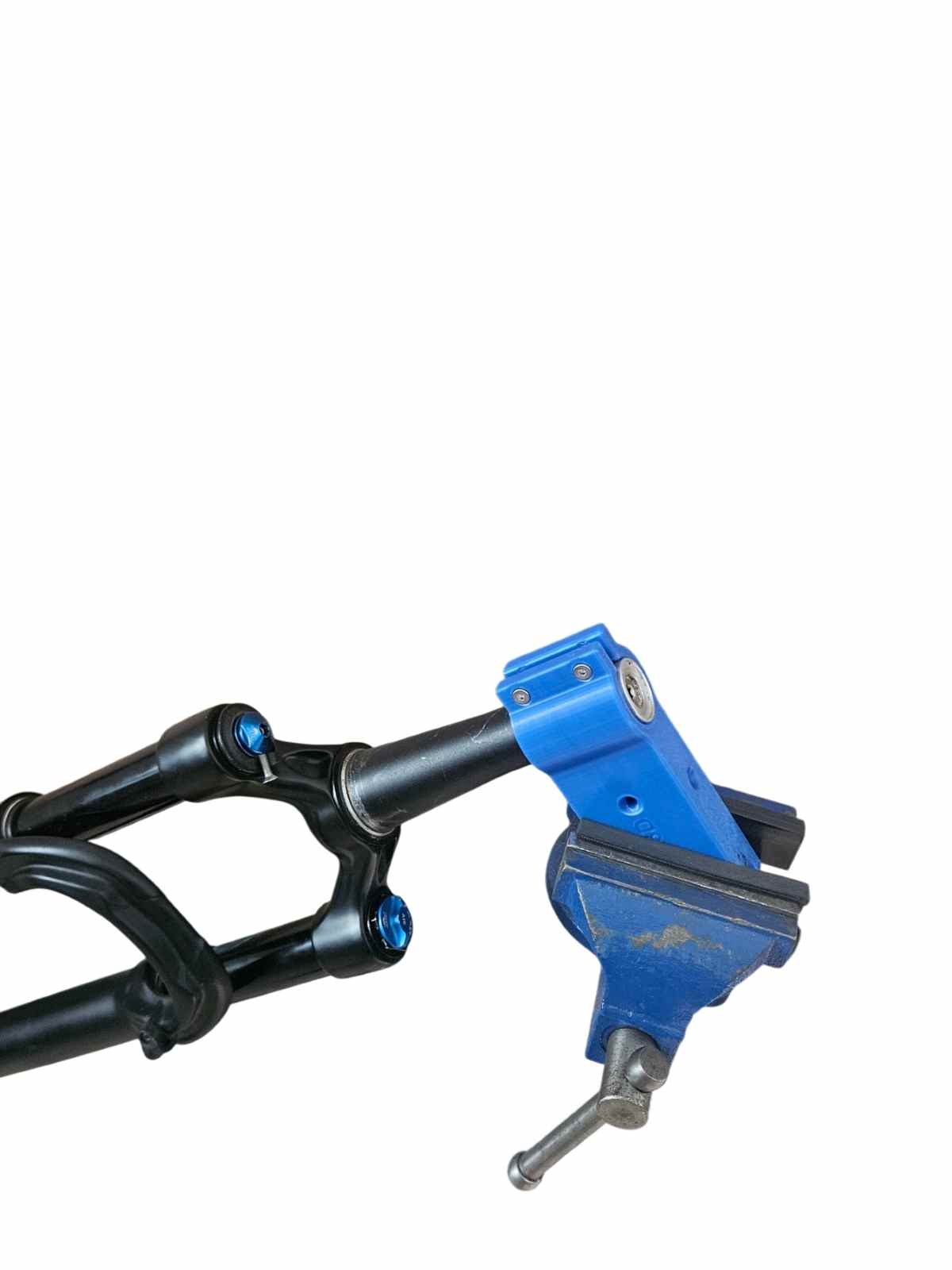 outil permettant de fixer dans un étau une fourche de vtt pour la réviser